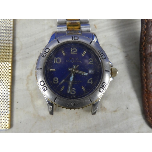 945 - A large lot of assorted watches for parts and repair.