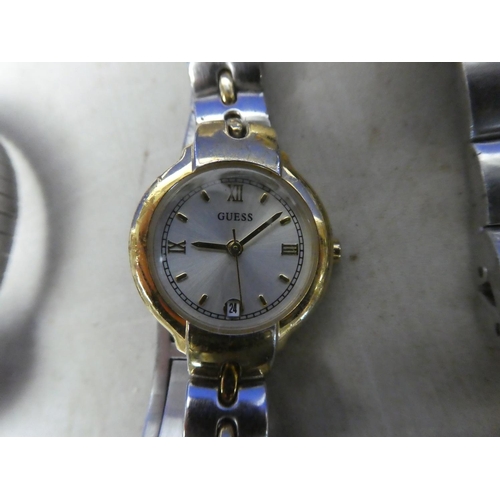 948 - A large lot of assorted mens watches for parts and repair.