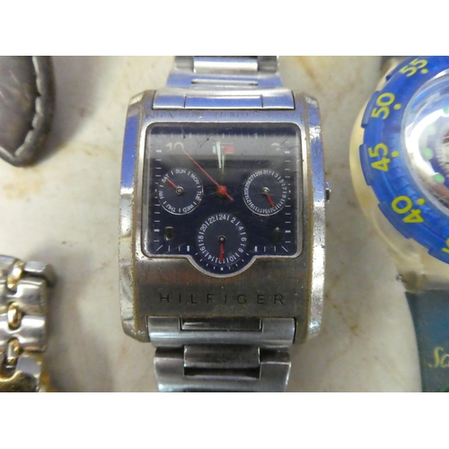 948 - A large lot of assorted mens watches for parts and repair.