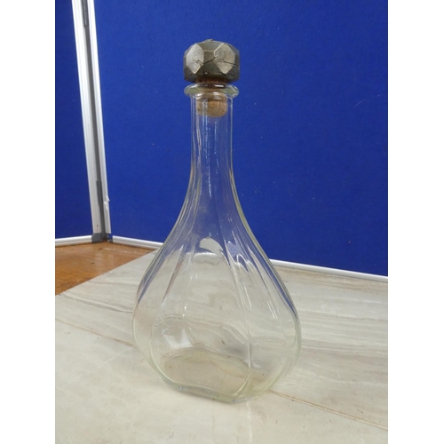 967 - An antique glass spirit bottle.