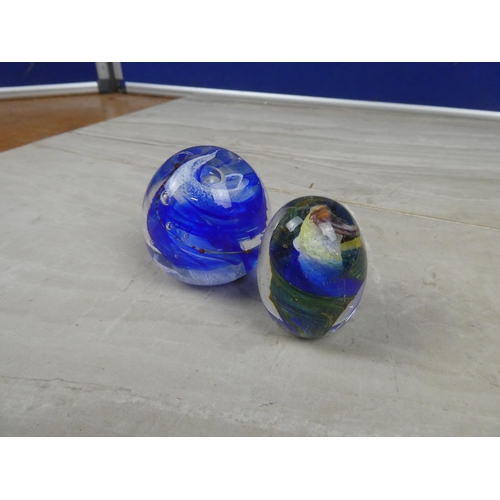 973 - A pair of art glass paperweights.