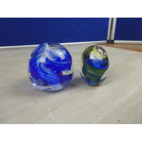 973 - A pair of art glass paperweights.