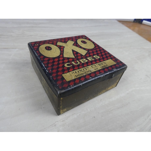 975 - A vintage OXO tin and a lot of vintage train patterned dominoes.