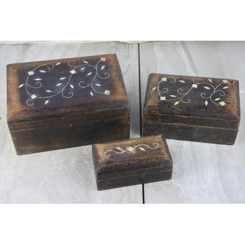 1020 - A set of three wooden jewellery boxes.