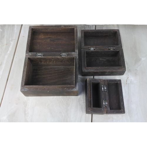 1020 - A set of three wooden jewellery boxes.