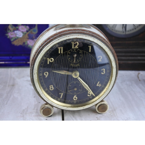 1026 - A stunning vintage Europa mantle clock with koha paua shell and four other clocks.