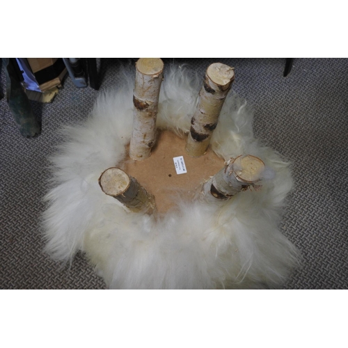 1038 - A stunning sheepskin covered stool.