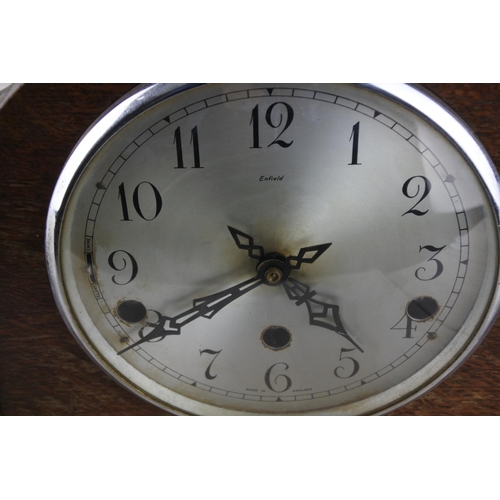 1048 - A vintage wooden cased Enfield mantle clock.