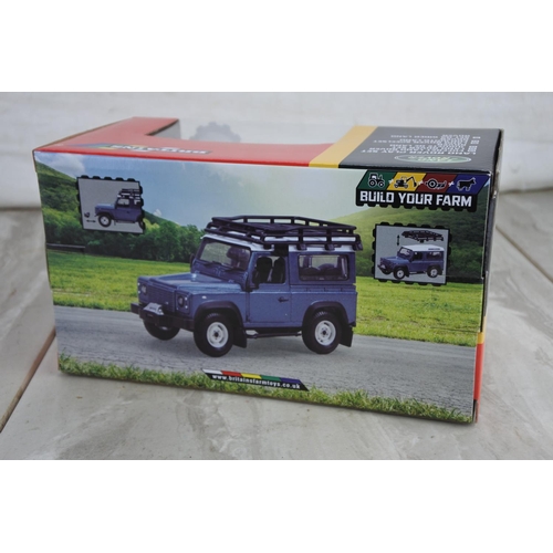 1051 - A boxed Britains Land Rover play set, scale 1:32.