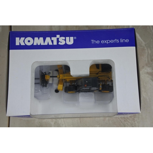 1055 - A boxed Universal Hobbies Komatsu WH613, scale 1:50.