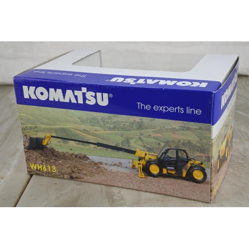 1055 - A boxed Universal Hobbies Komatsu WH613, scale 1:50.