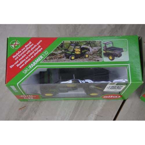 1064 - A boxed Siku 3068 Aebi TerraTrac TT211, a boxed Siku 3060 John Deere Gator and a boxed Vicon Pendulu... 