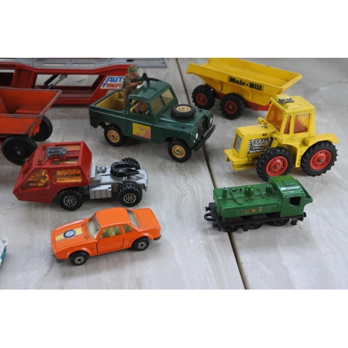 1085 - An assorted lot of toy vehicles to include a Lone Star dumper truck, a Britains 1975 army land rover... 