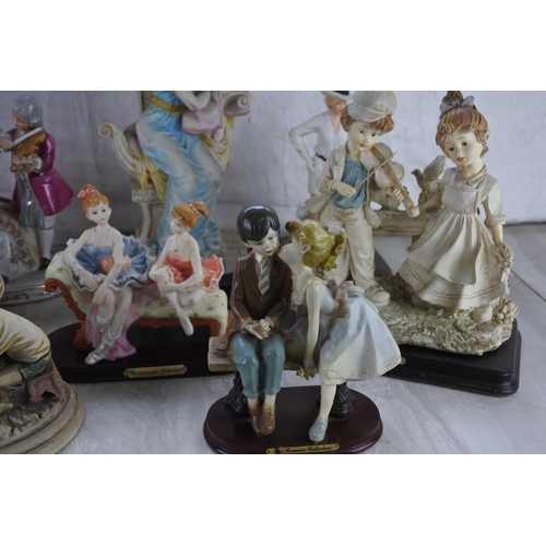 1091 - An assorted lot of ceramic figurines.