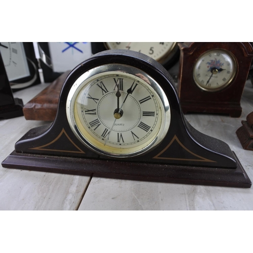 1095 - A very large lot of assorted mantle and wall clocks.