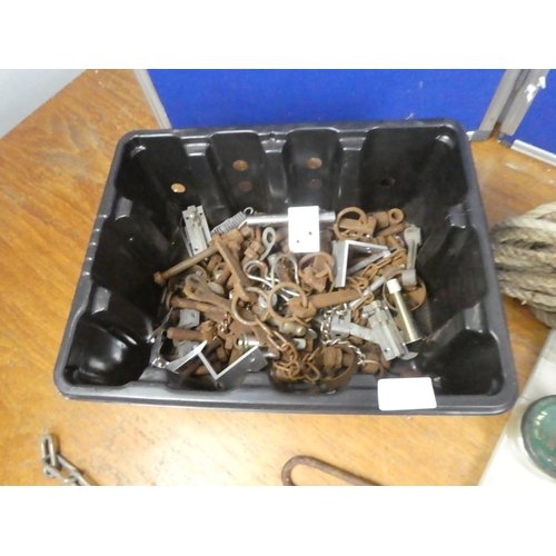 619 - A lot of assorted nails and screws in jampots and more.