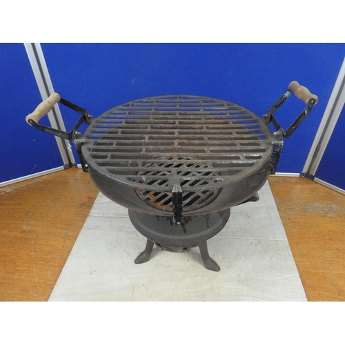 627 - A portable cast iron barbecue.