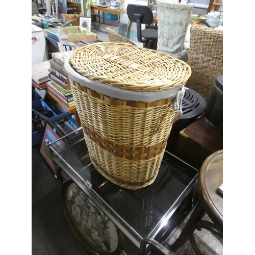 639 - A rattan linen basket.