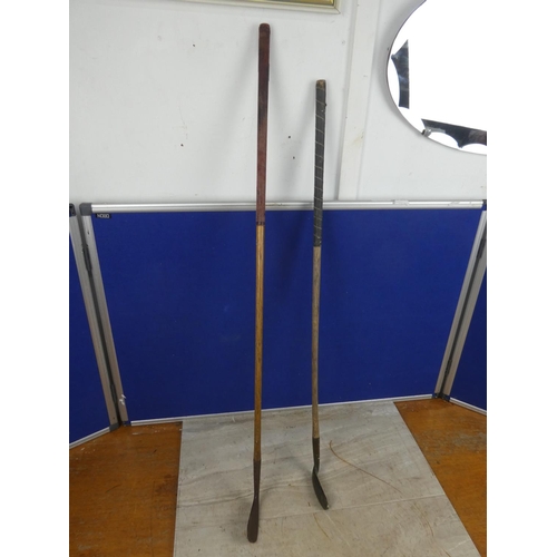 648 - Two antique Hickory Shaft golf clubs.