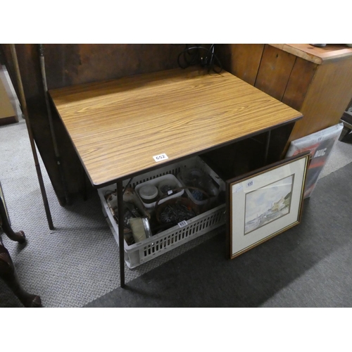 652 - A vintage folding table.