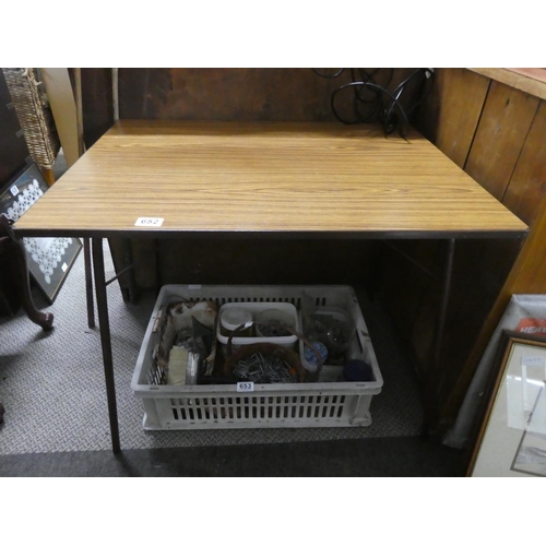 652 - A vintage folding table.