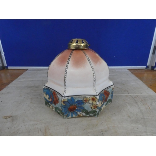 664 - A vintage glass lamp shade decorated with flowers and brass fittings.