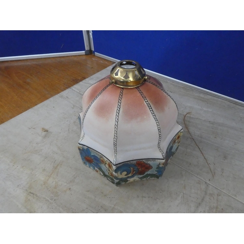 664 - A vintage glass lamp shade decorated with flowers and brass fittings.