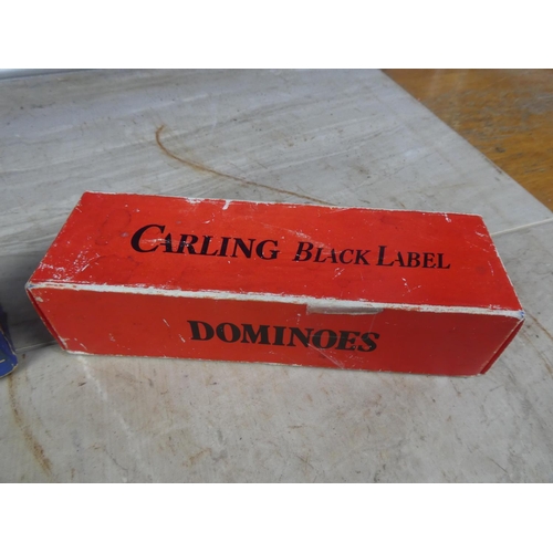 669 - A vintage boxed Carling Black Label and Chad Valley dominoes games.