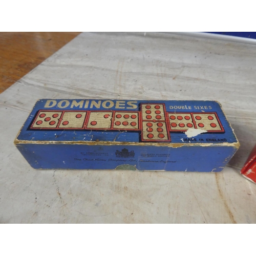 669 - A vintage boxed Carling Black Label and Chad Valley dominoes games.