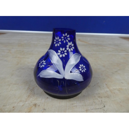 675 - A small antique bristol blue hand painted vase.