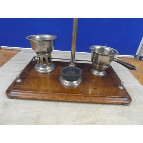 679 - A Campaign shaving mirror on an oak stand.  Approx 38x53x23cm.