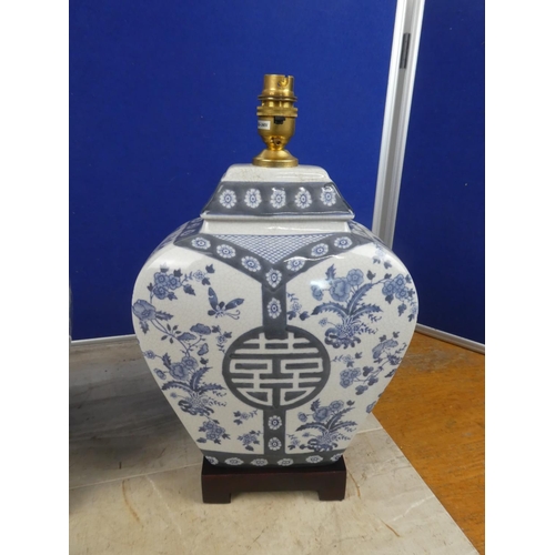 680 - A stunning pair of blue and white Chinese themed ceramic table lamp bases.  Approx 40cm.