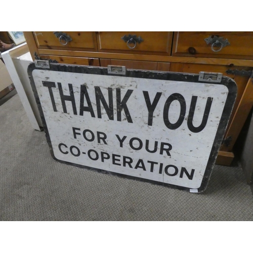 683 - A double sided road sign 'Stop Checkpoint Headlights Off' and 'Thank you for Your Co-Operation'.  Ap... 