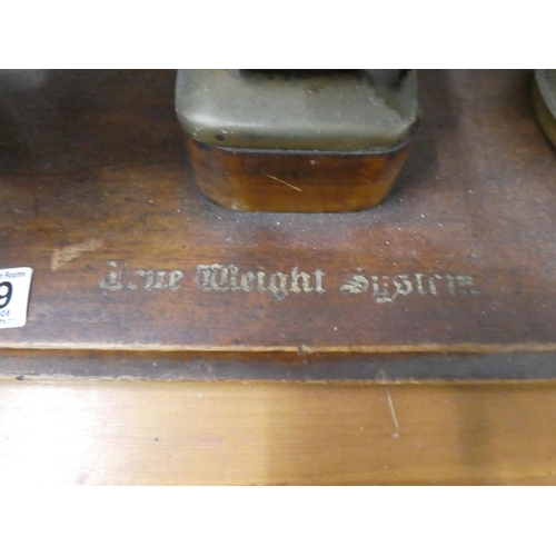 689 - A vintage Autobac True Weight System set of balance shop scales mount on a wooden base.  Approx 51x5... 