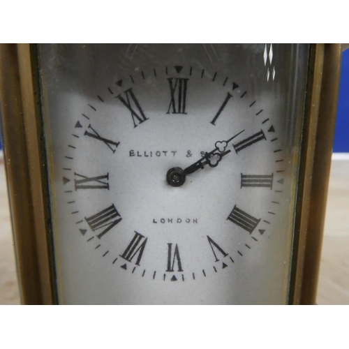 690 - A stunning miniature Ellliott & Son, London carriage clock, with decorative brass case and ceramic f... 