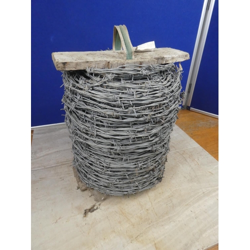 696 - A roll of barbed wire.