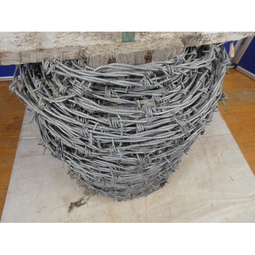 696 - A roll of barbed wire.