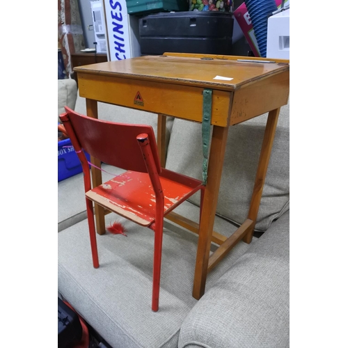 1198 - A vintage Triang child's desk and red painted chair.  Approx 53x60x40cm.