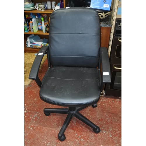 1206 - A leather swivel office chair.