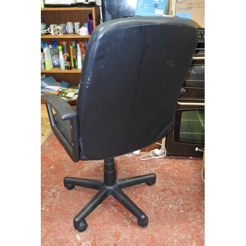 1206 - A leather swivel office chair.