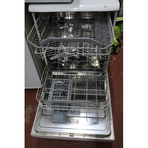 1209 - A Hotpoint dishwasher.