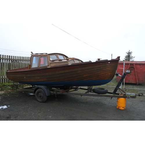 1212 - A stunning 19ft clinker fishing boat with cabin and boat trailer.