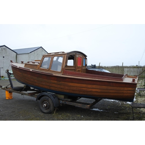 1212 - A stunning 19ft clinker fishing boat with cabin and boat trailer.