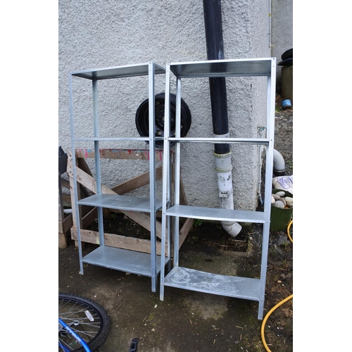 1218 - Two metal shelving units.