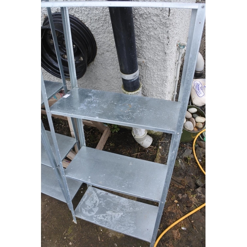 1218 - Two metal shelving units.