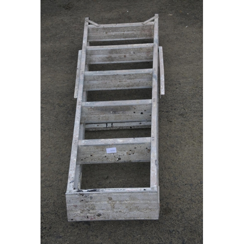 1225 - A metal step-ladder.