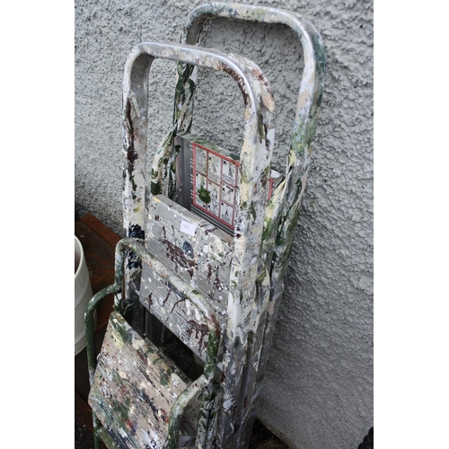 1231 - A metal step ladder.