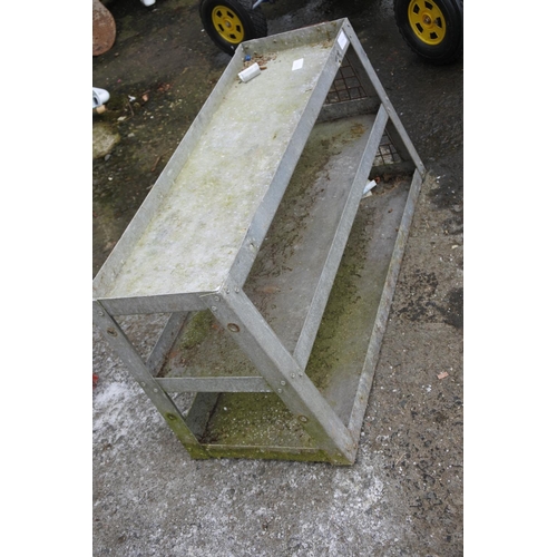 1237 - A small metal shelving unit.