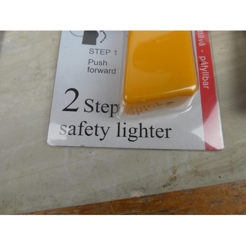 1104 - A lot of new two step safety lighters.