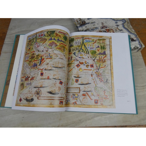 1118 - A boxed Folio Society book 'Mapping the World'.